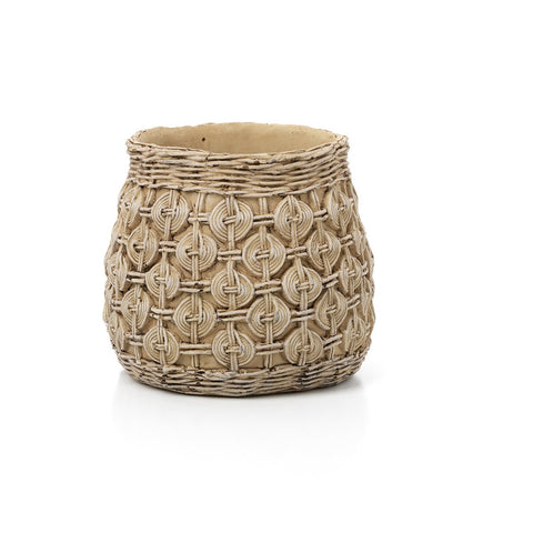 Fioriera scultorea da pavimento in cemento marrone terra Knot XL con texture a rilievo in stile Japandi.