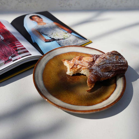 Comporta stoneware plate used to serve tapas and finger food on a set table