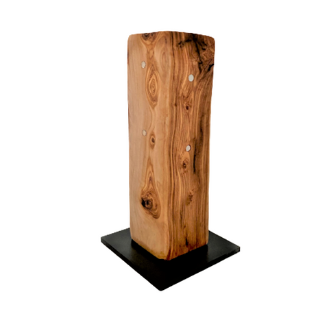 Dettaglio delle venature del ceppo magnetico in legno d'ulivo artigianale